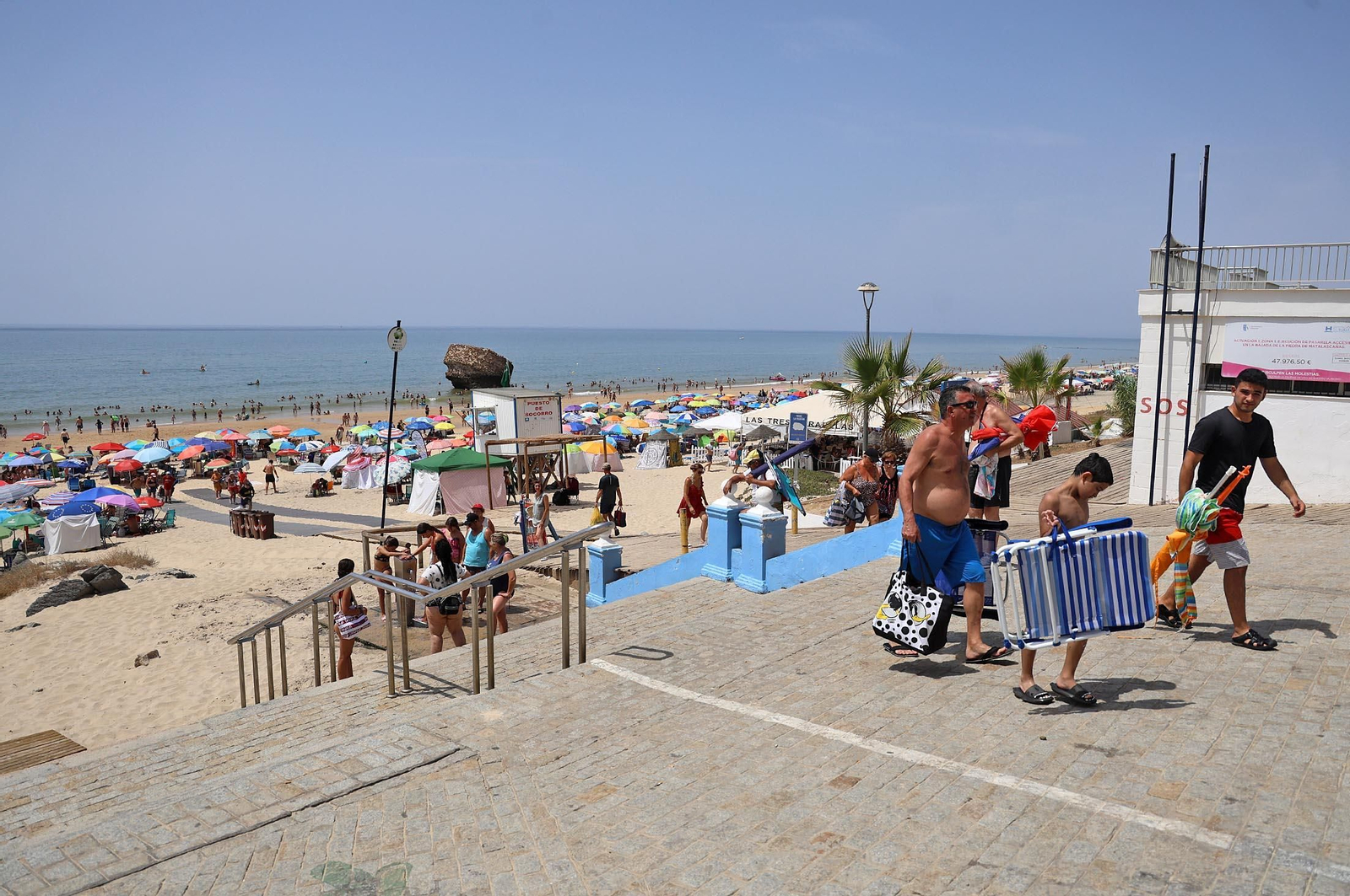 Imágenes del caluroso día en la playa de Matalascañas