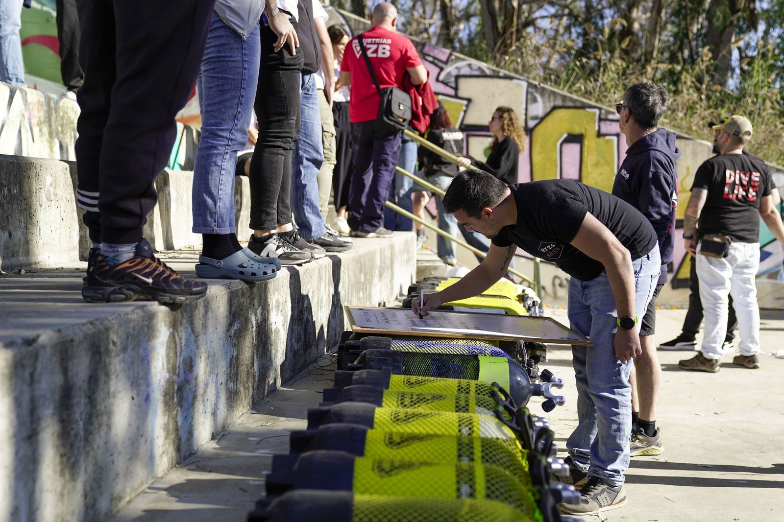 La limpieza solidaria del Guadalquivir en el Centro Náutico del Alamillo, todas las fotos