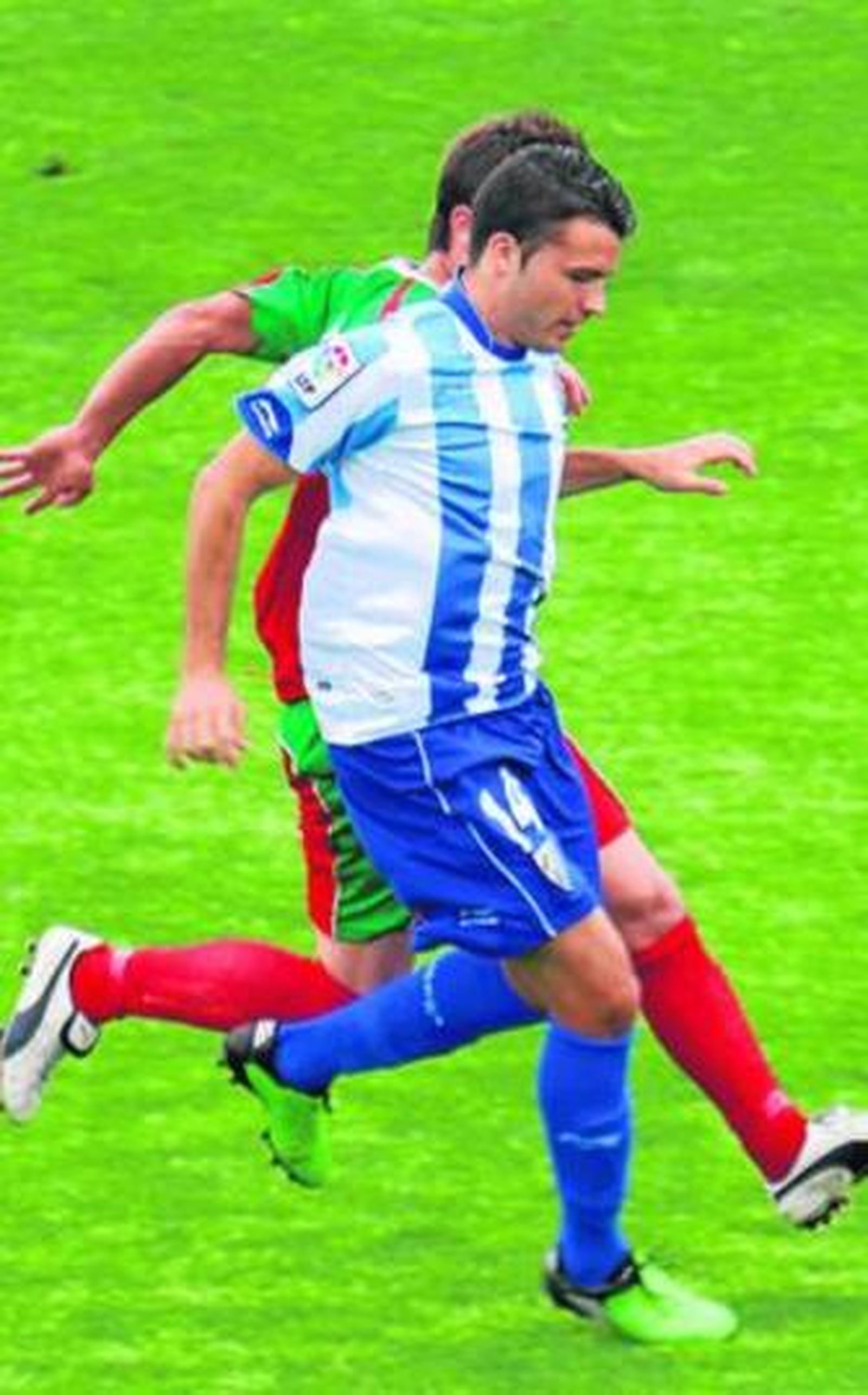 Imagen de un partido entre el Malagueño y El Palo.