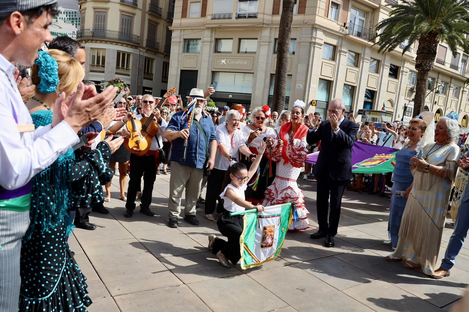 La Romería al Santuario de la Victoria que inicia la Feria de Málaga, en fotos