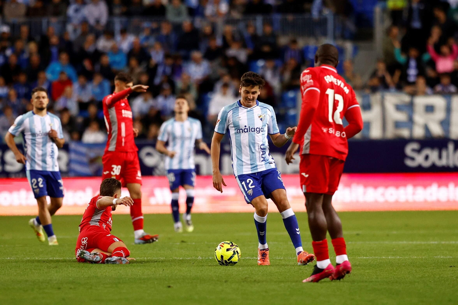 Las fotos del imponente ambiente en La Rosaleda en el Málaga - Córdoba CF