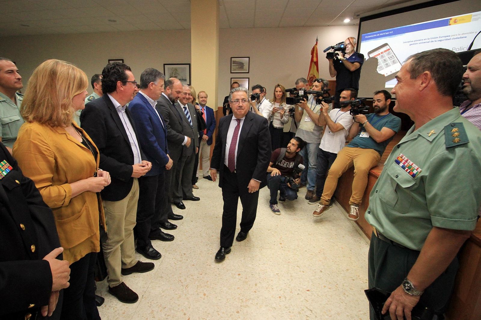 Juan Ignacio Zoido, ministro del Interior, presenta en la Comandancia de la Guardia Civil la nueva versión de AleryCops y el dispositivo del Rocío y posteriormente acude a la Diputación de Huelva para visitar la exposición sobre el terrorismo, en imágenes