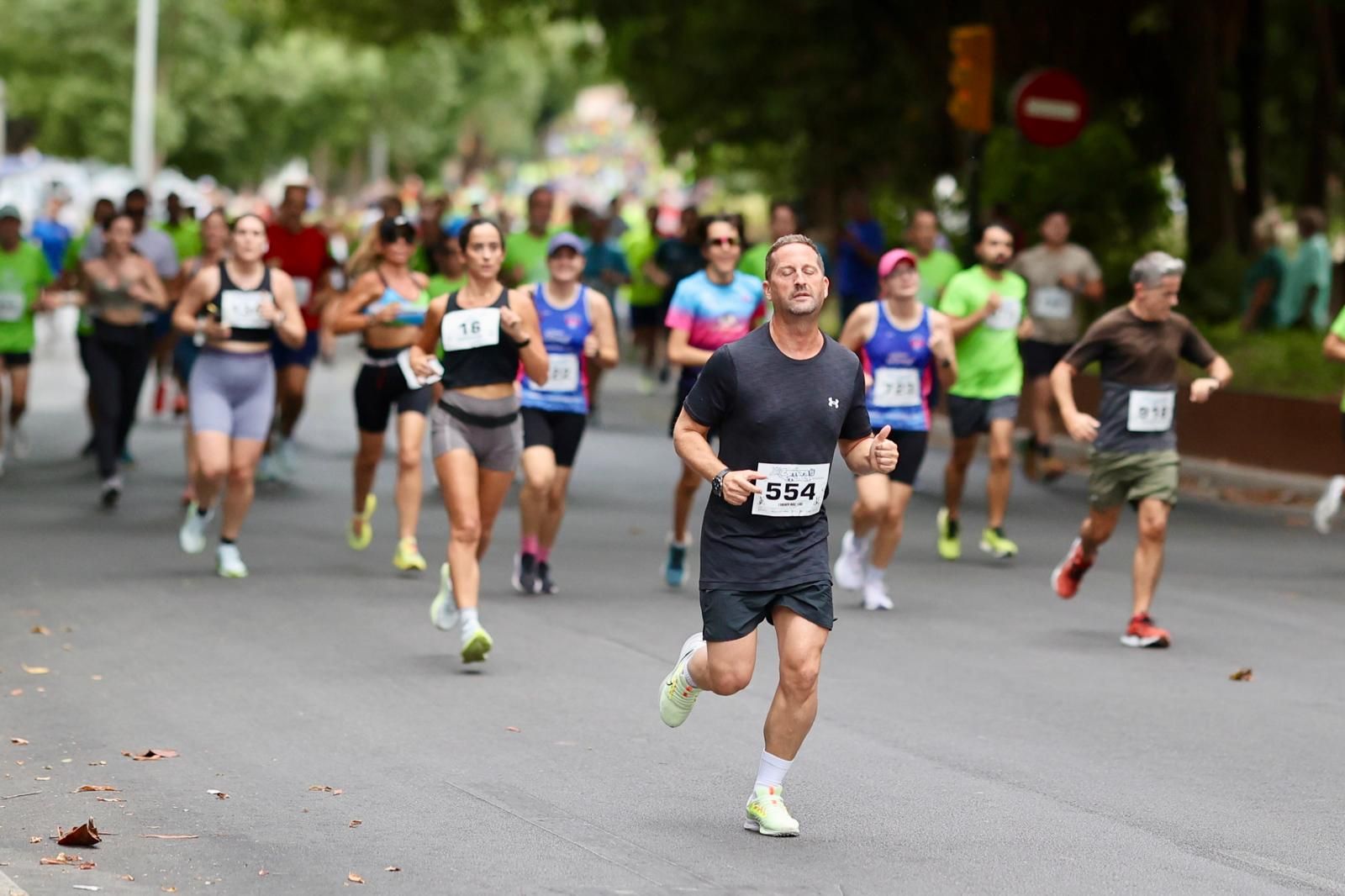 Las fotos de la VIII Carrera de la Prensa y la IV Marcha Solidaria de Málaga