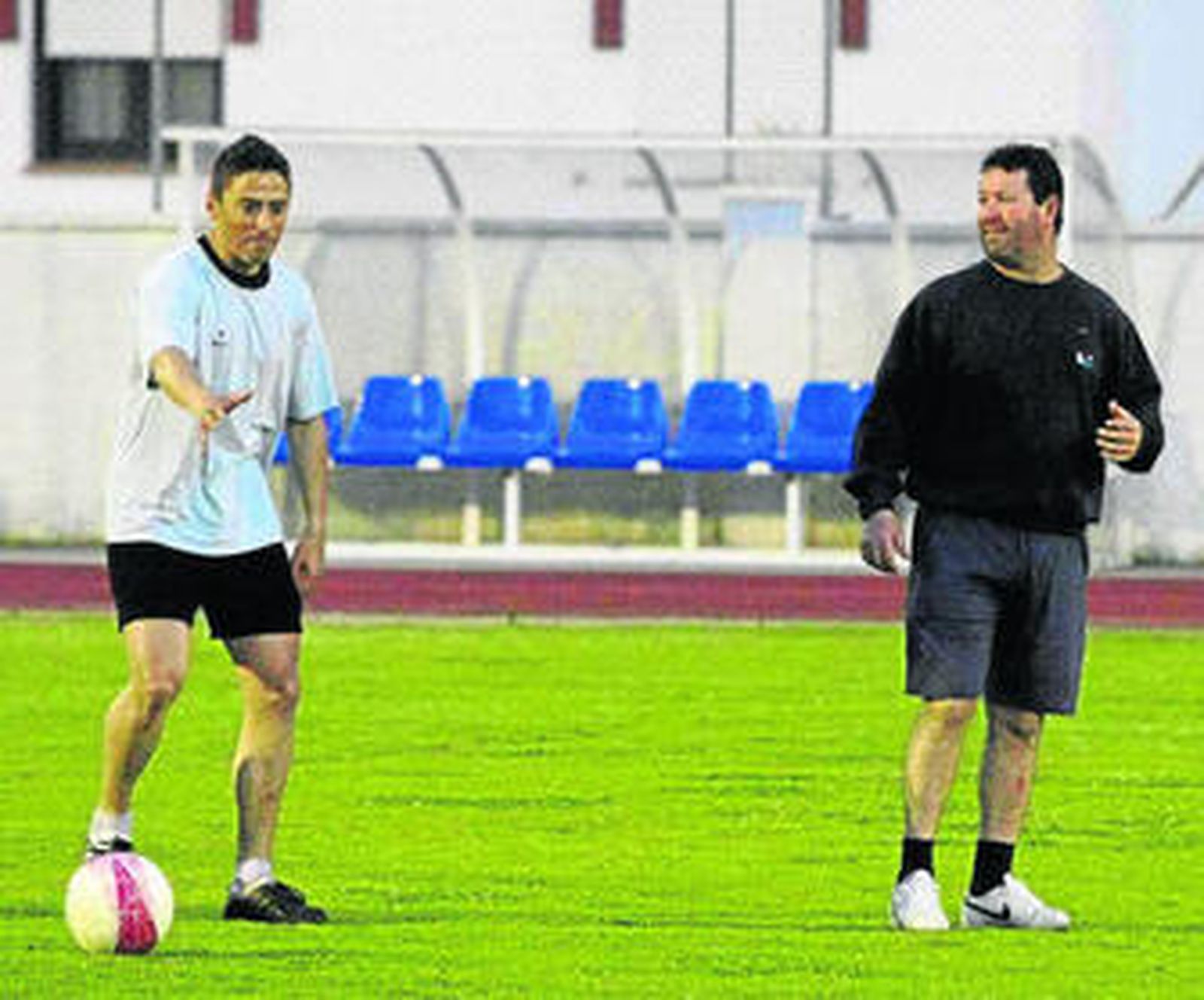 Alfonso Collado -derecha-, junto a Iván Peña en un entrenamiento.