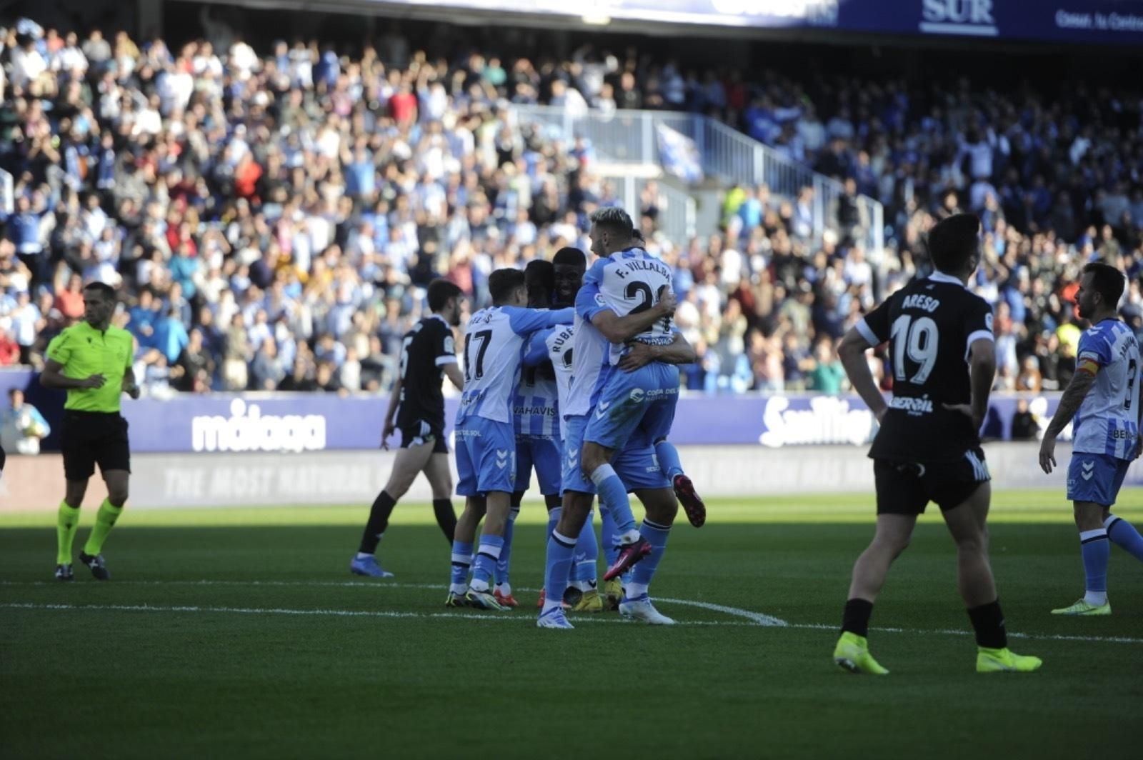 Los jugadores del Málaga celebrando un gol.