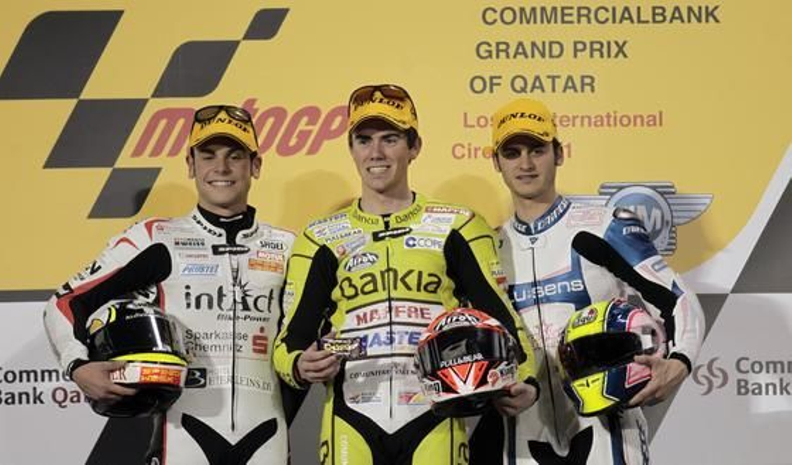 Podio del Gran Premio de Qatar de 125 cc, con Sandro Cortese y los españoles Nicolás Terol y Sergio Gadea.

Foto: Reuters