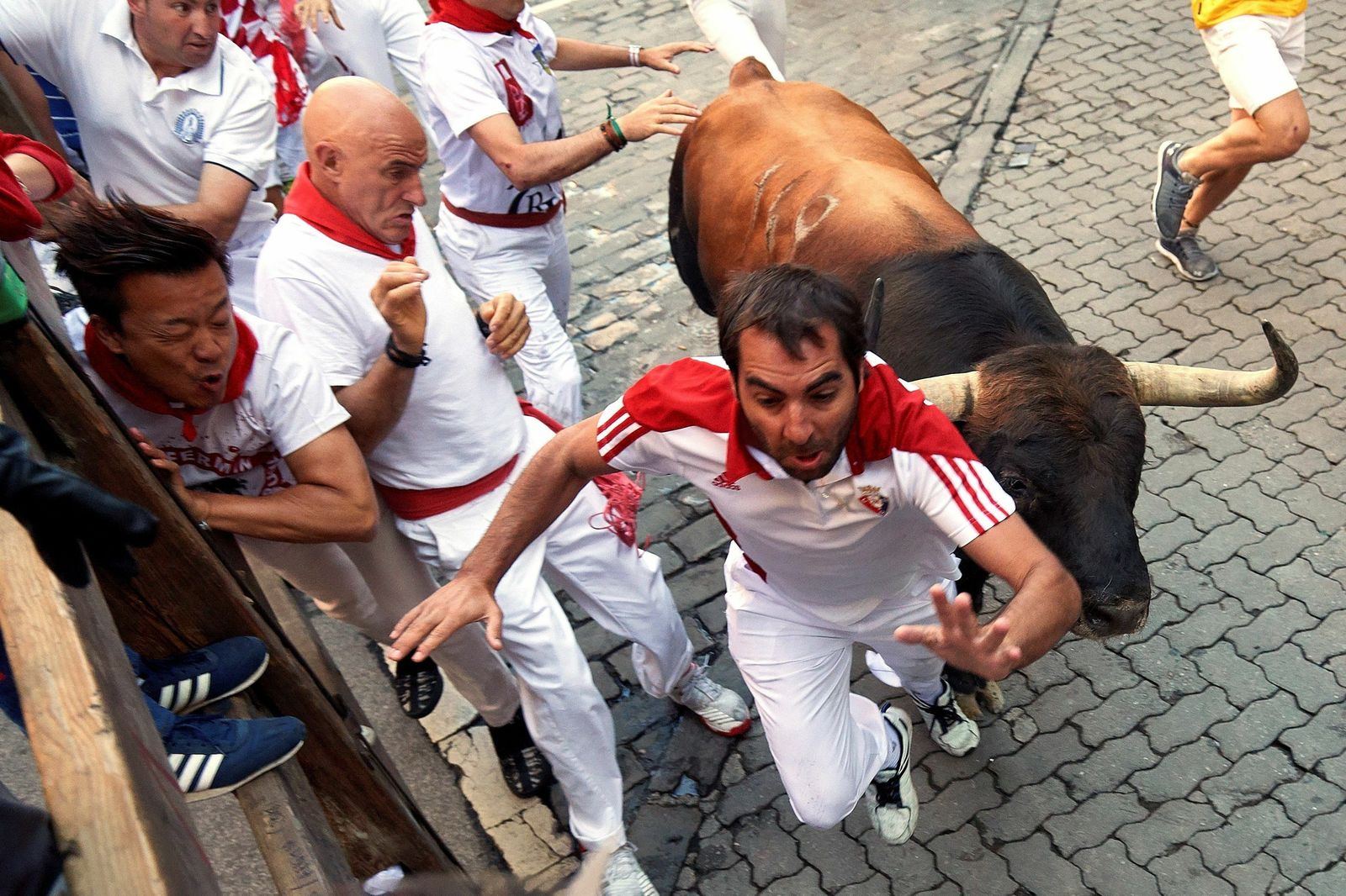 Las imágenes del sexto encierro de San Fermín 2019