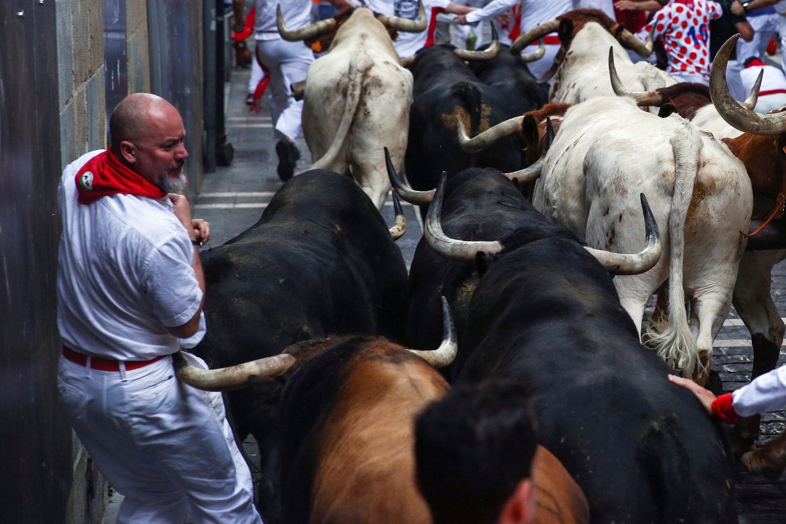 El sexto encierro de los Sanfermines, en imágenes
