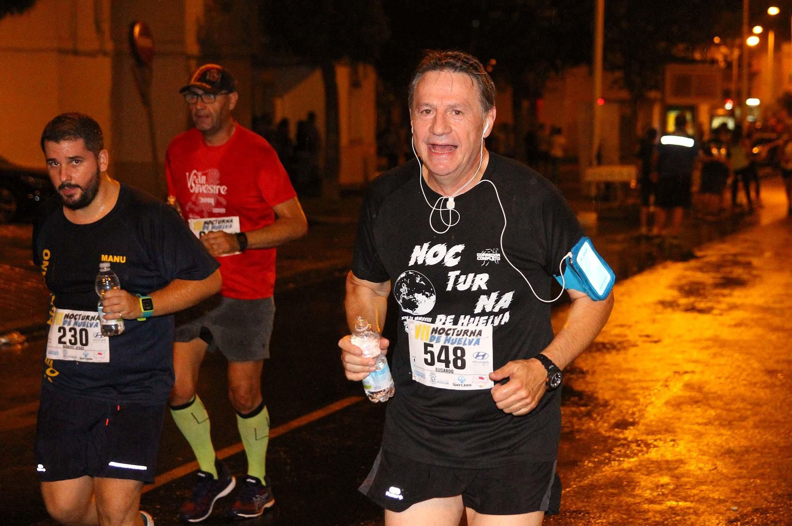 La VII Carrera Nocturna de Huelva en imágenes
