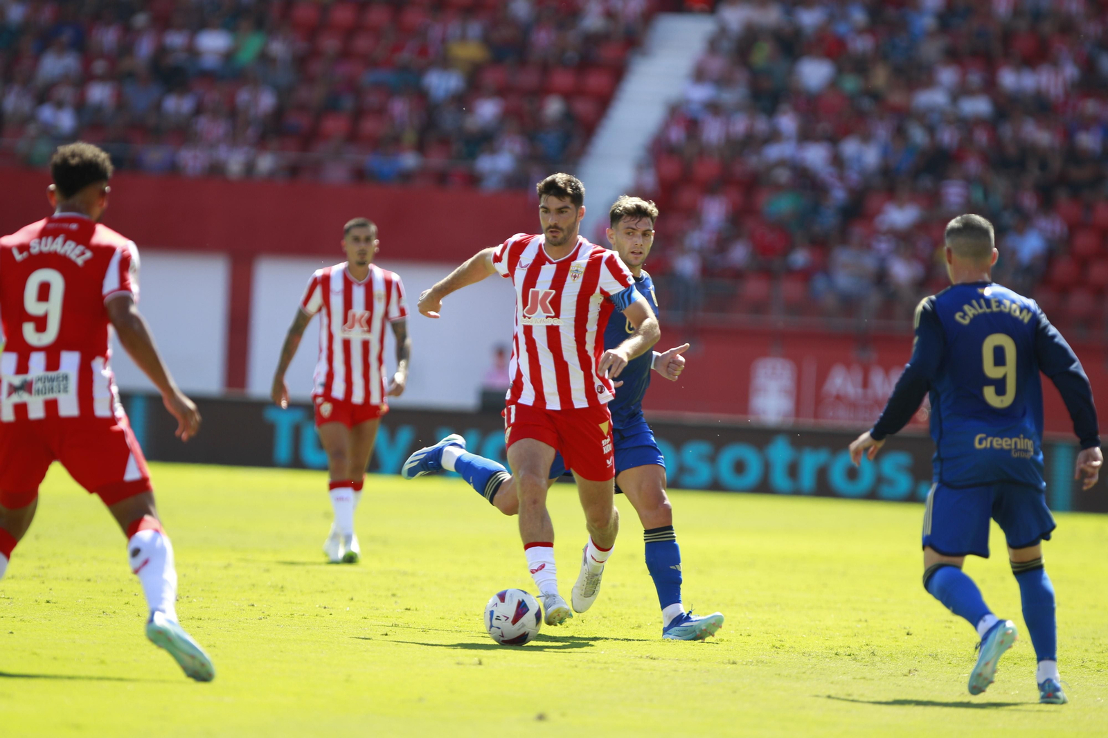 Imágenes del empate a 3 de la U.D. Almería y el Granada C.F.