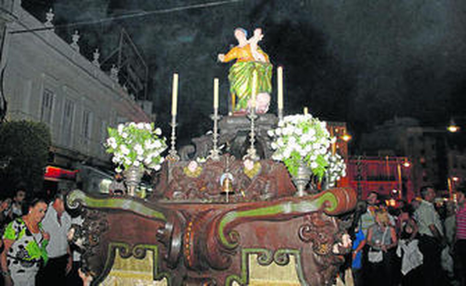 Procesión de la JCC por la calle Real.