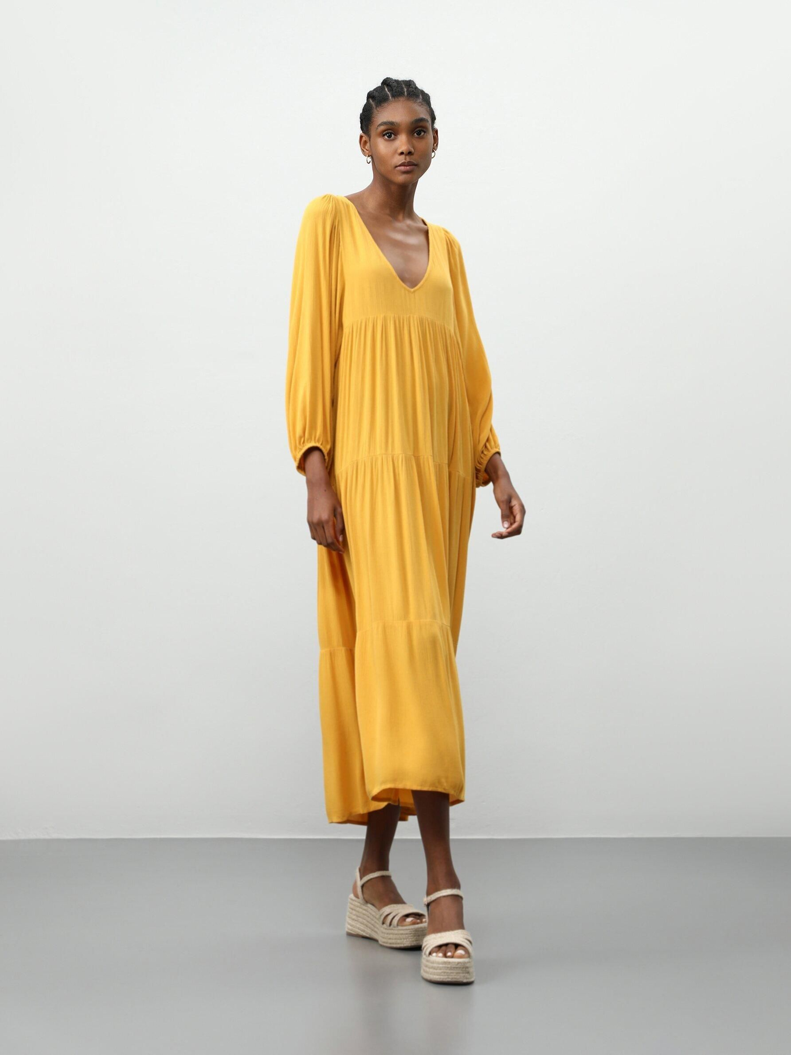 Vestido amarillo de Lefties. Vestido amarillo de Lefties.