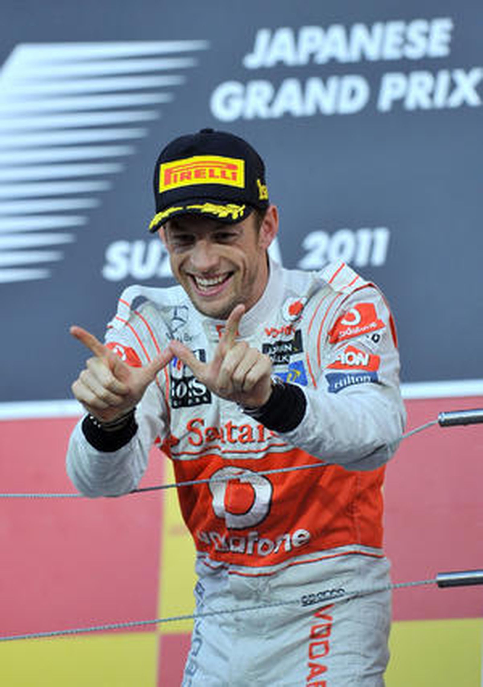 Sebastian Vettel gana en Suzuka su segundo mundial a cuatro carreras del final del campeonato. / AFP