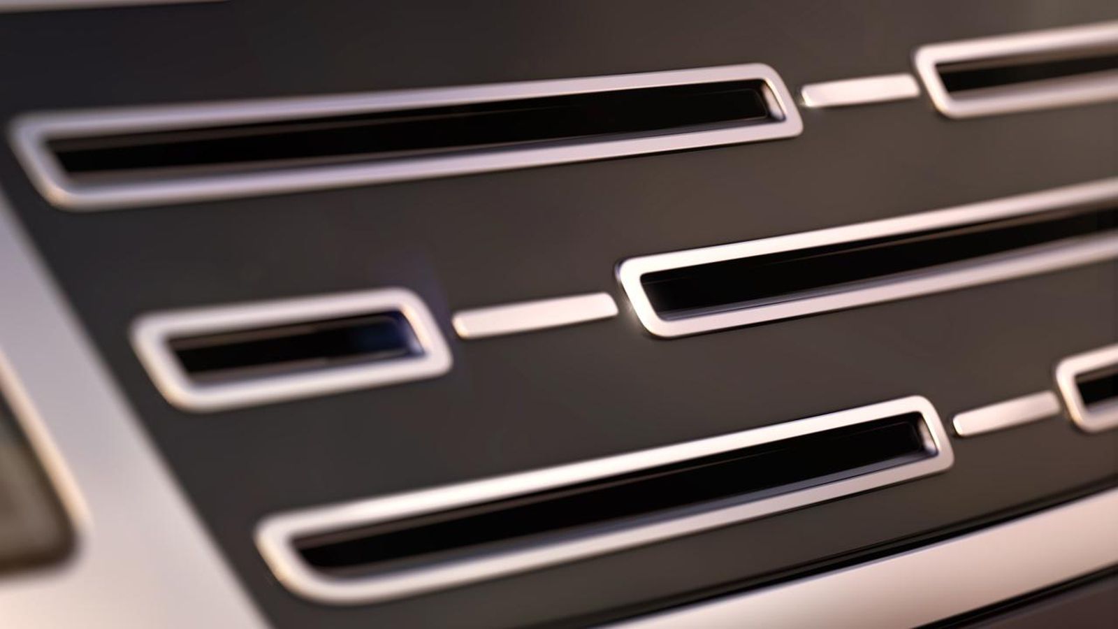 Por ahora, JLR sólo ha aportado imágenes de algunos detalles de la carrocería, como una parrilla semejante a algunas versiones ya existentes del Range Rover. Por ahora, JLR sólo ha aportado imágenes de algunos detalles de la carrocería, como una parrilla semejante a algunas versiones ya existentes del Range Rover.