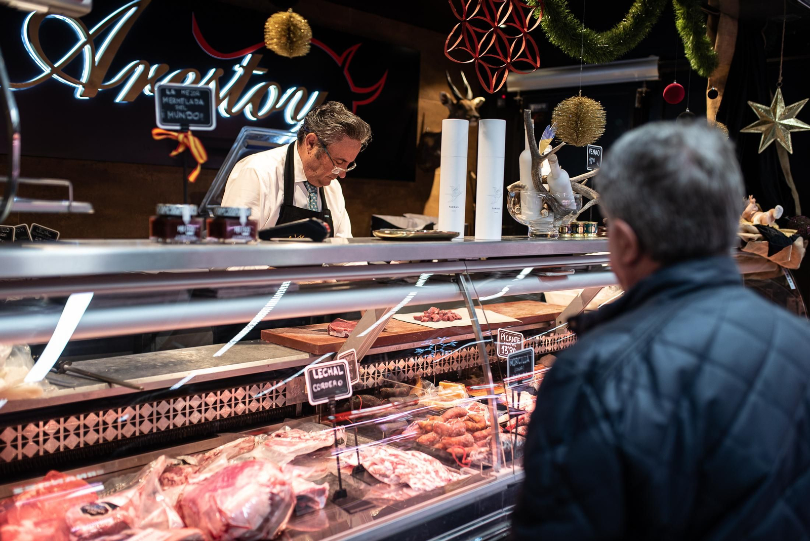 Las últimas compras en el Mercado del Carmen antes de Navidad, en imágenes