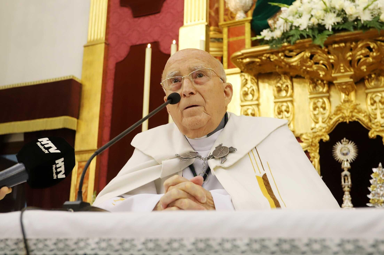 Imágenes de la procesión de la Virgen de la Amargura por las calles de Huelva