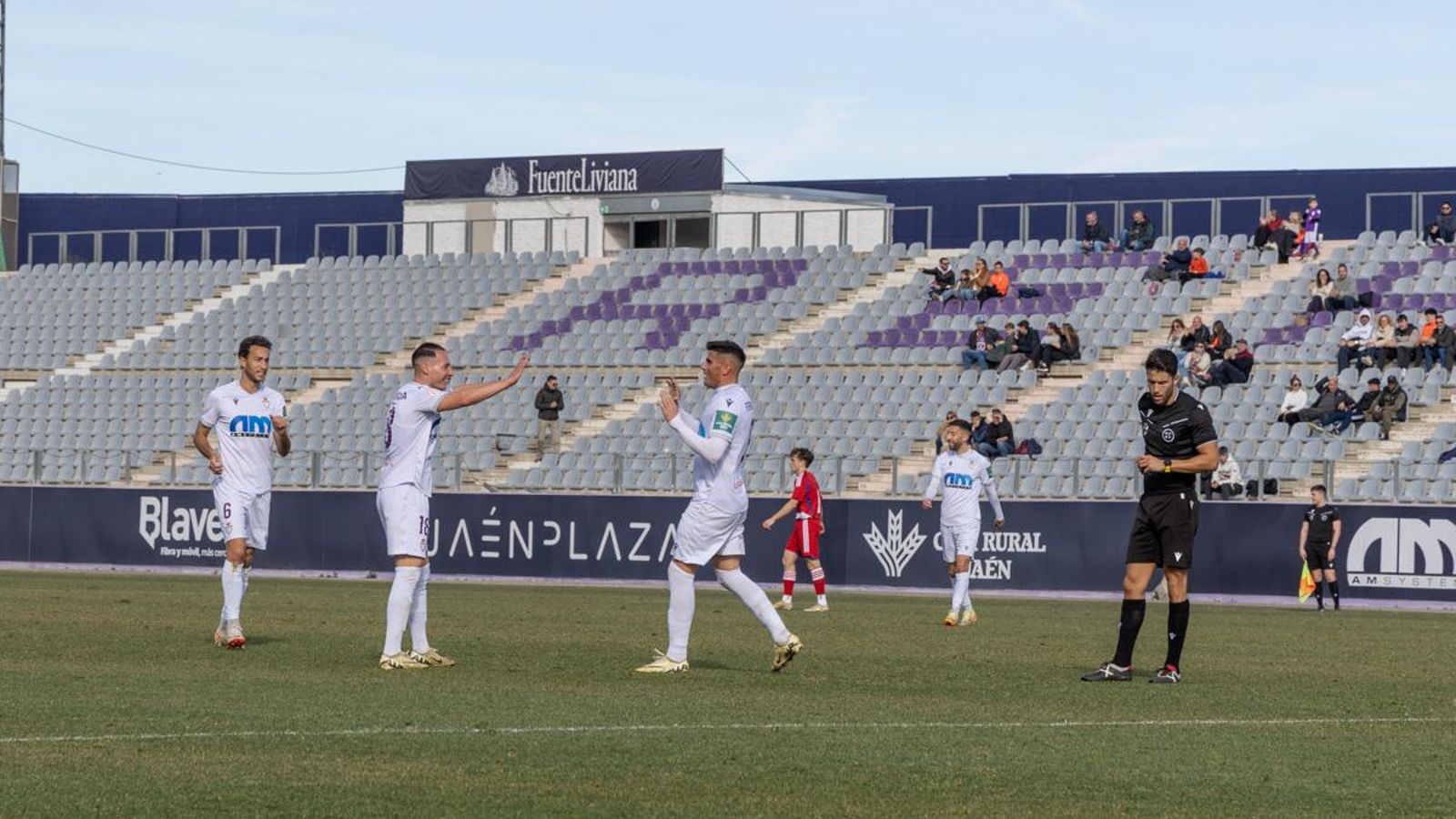 Fernando y Migue García, protagonistas del tercer gol del Real Jaén.