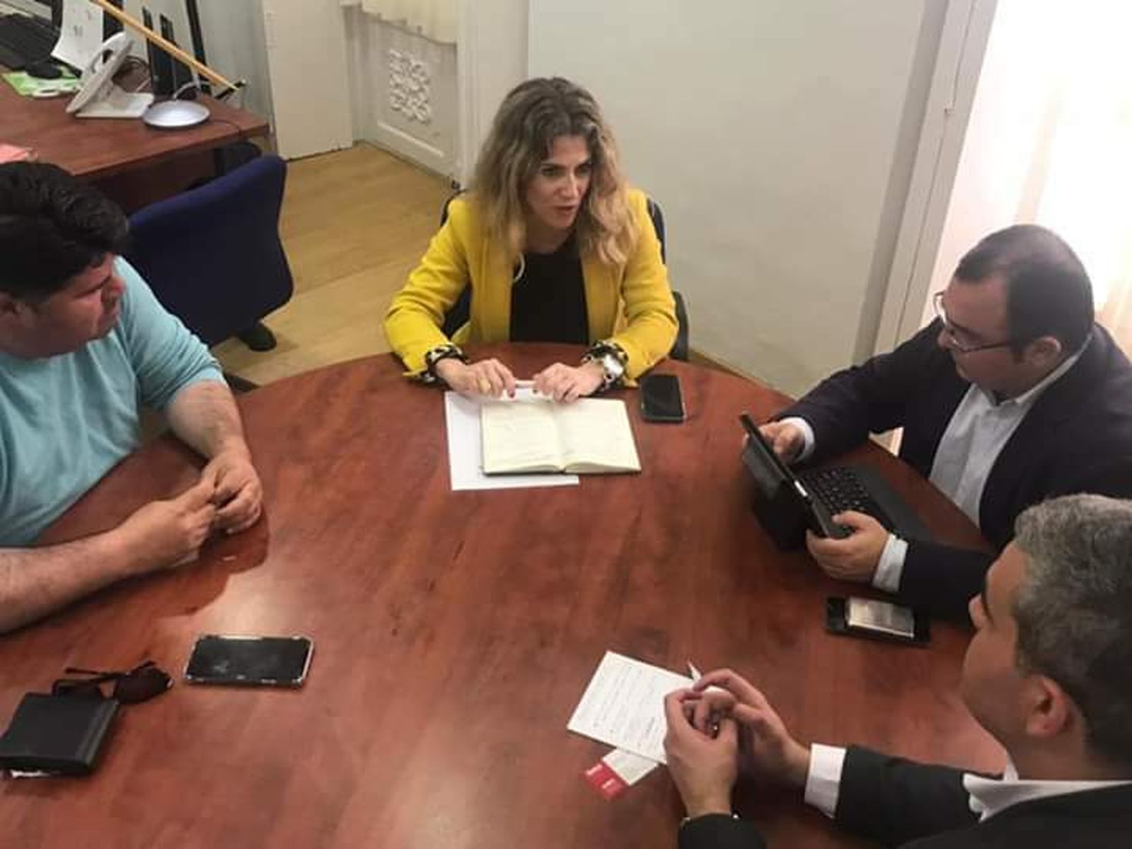 Dirigentes del PP y de Femca, durante la reunión mantenida este jueves.