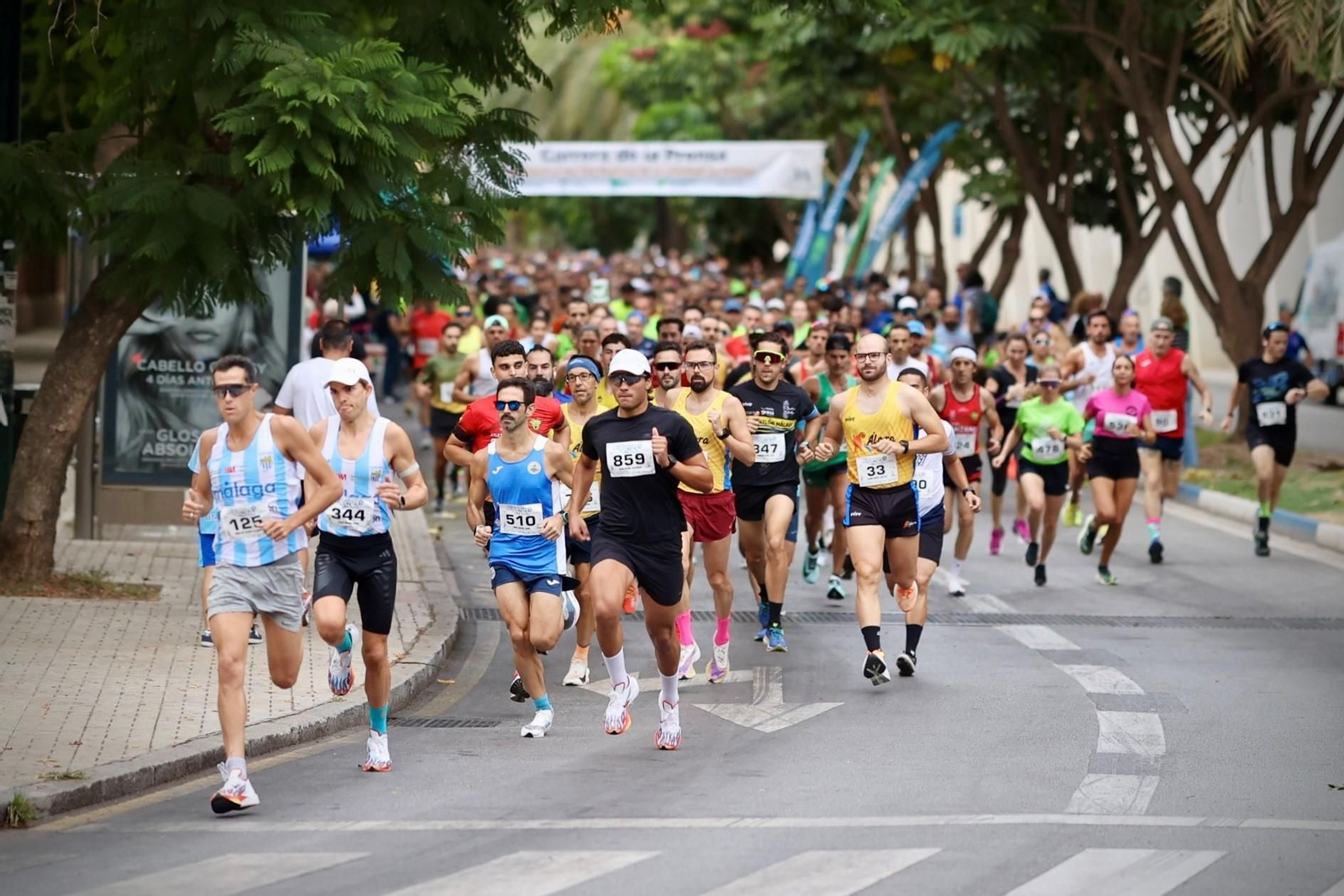 Las fotos de la VIII Carrera de la Prensa y la IV Marcha Solidaria de Málaga