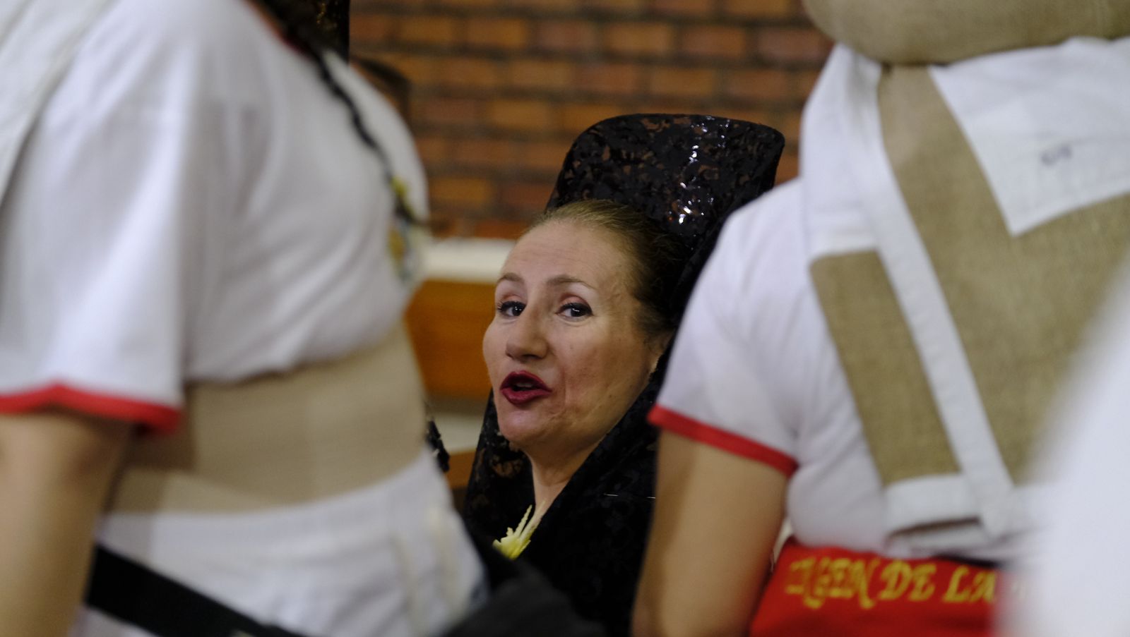 La Borriquita procesiona por las calles de Almería, en imágenes
