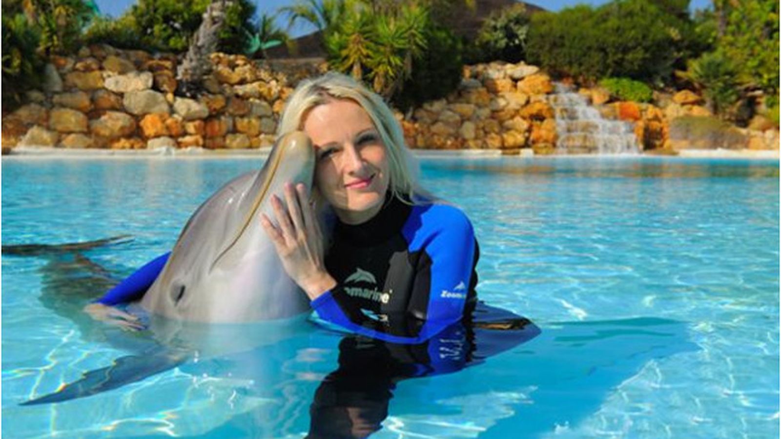 Nadar entre delfines en el Algarve portugués.