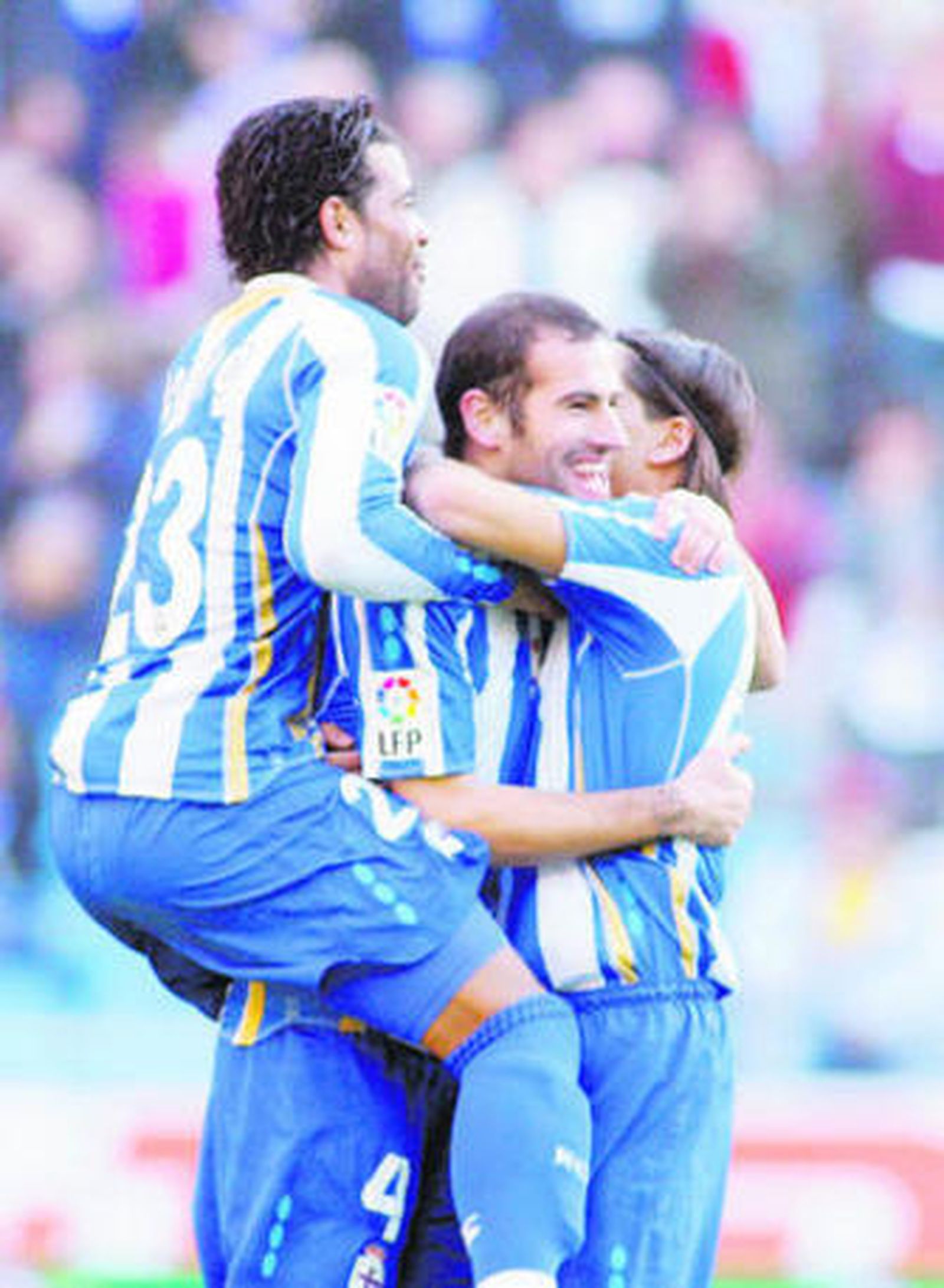 Lopo y Filipe Luis.