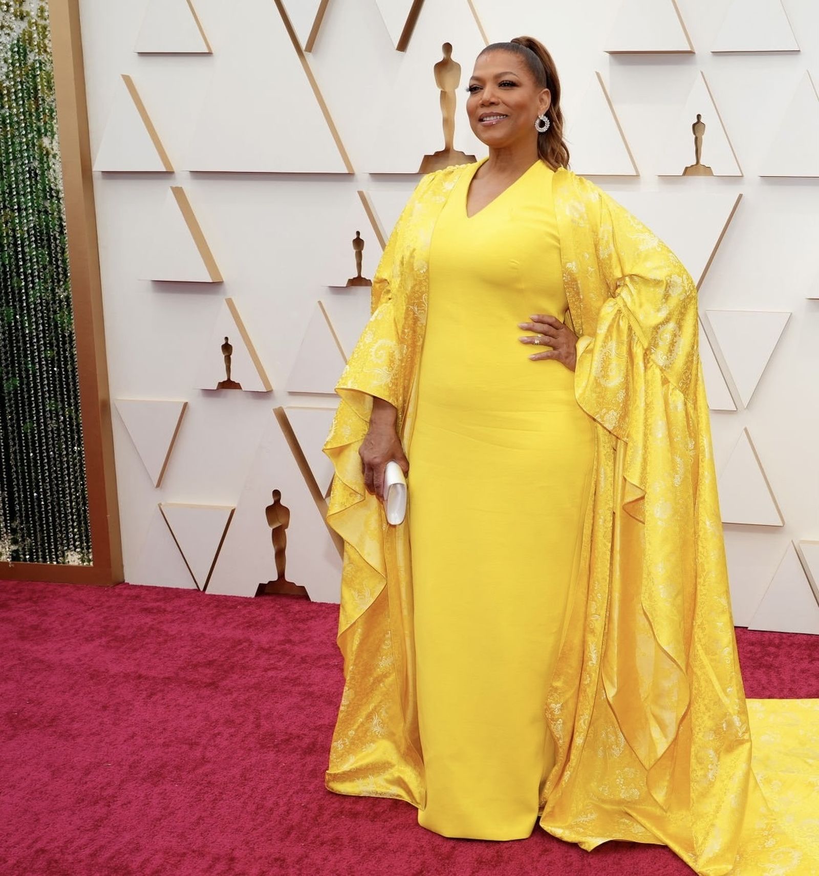 Queen Latifah, de amarillo.