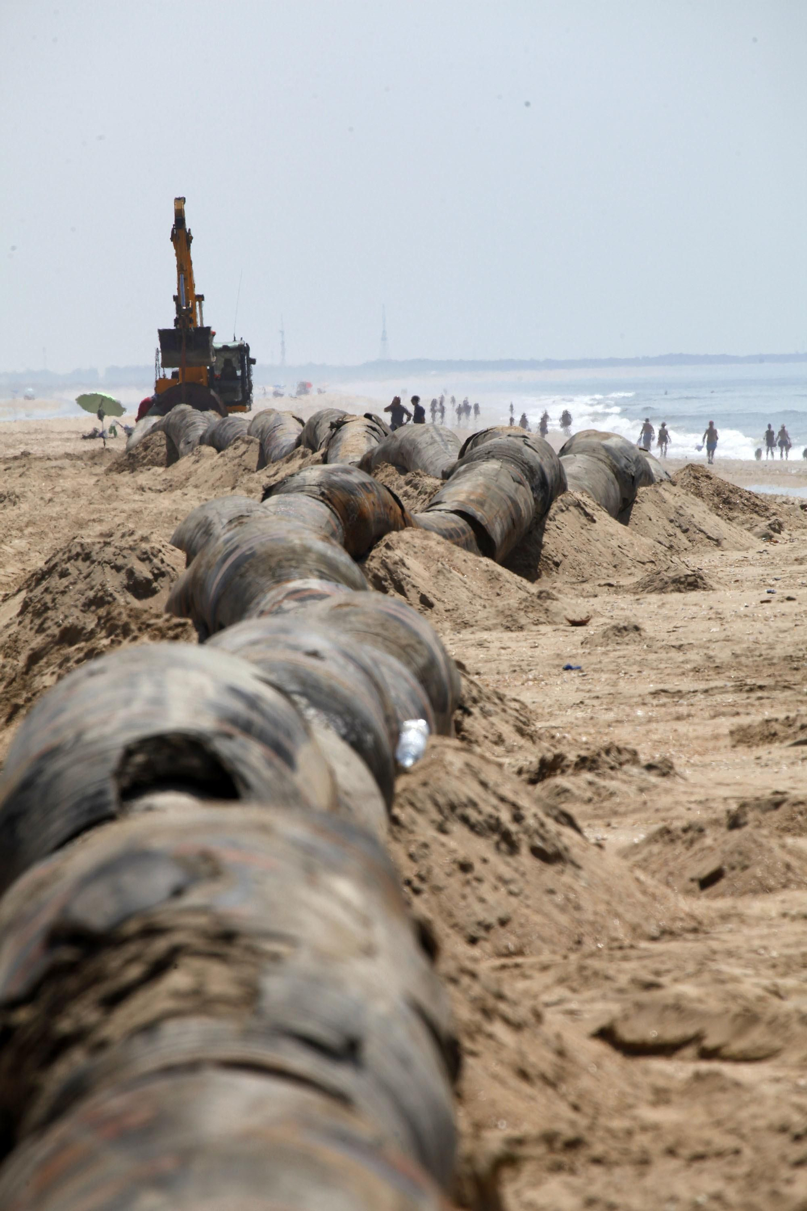 Las imágenes de la recuperación de la playa de La Antilla