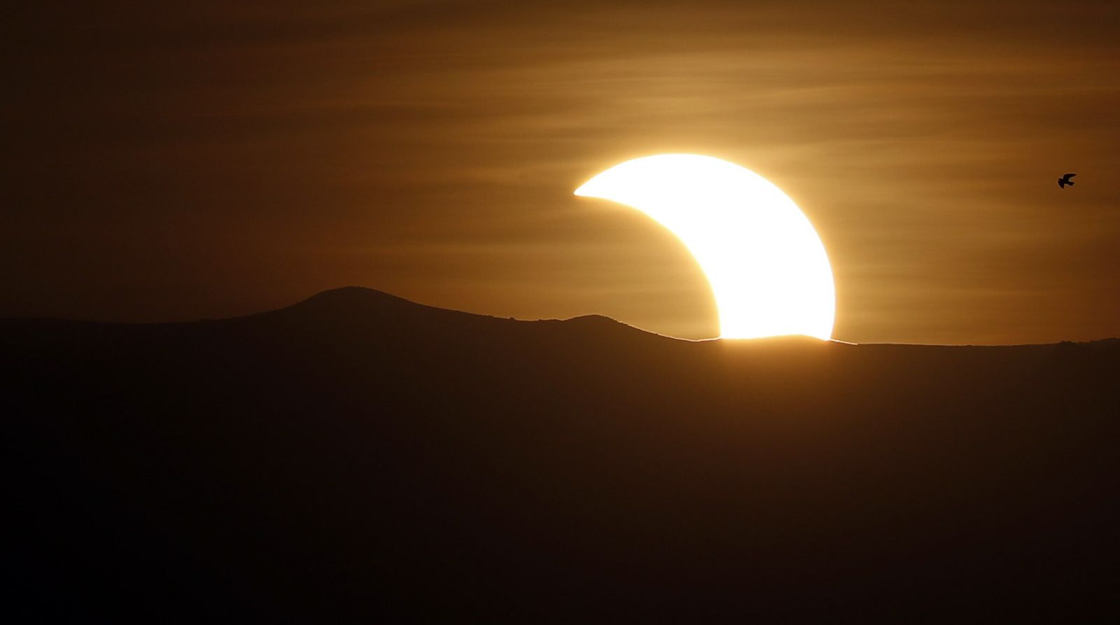 Las imágenes del último eclipse solar de la década