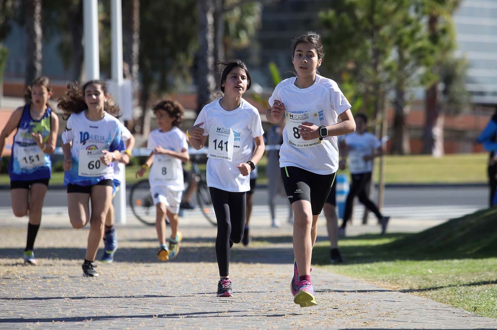 Imágenes de la carrera infantil previa a la "10K Puerta del Descubrimiento"