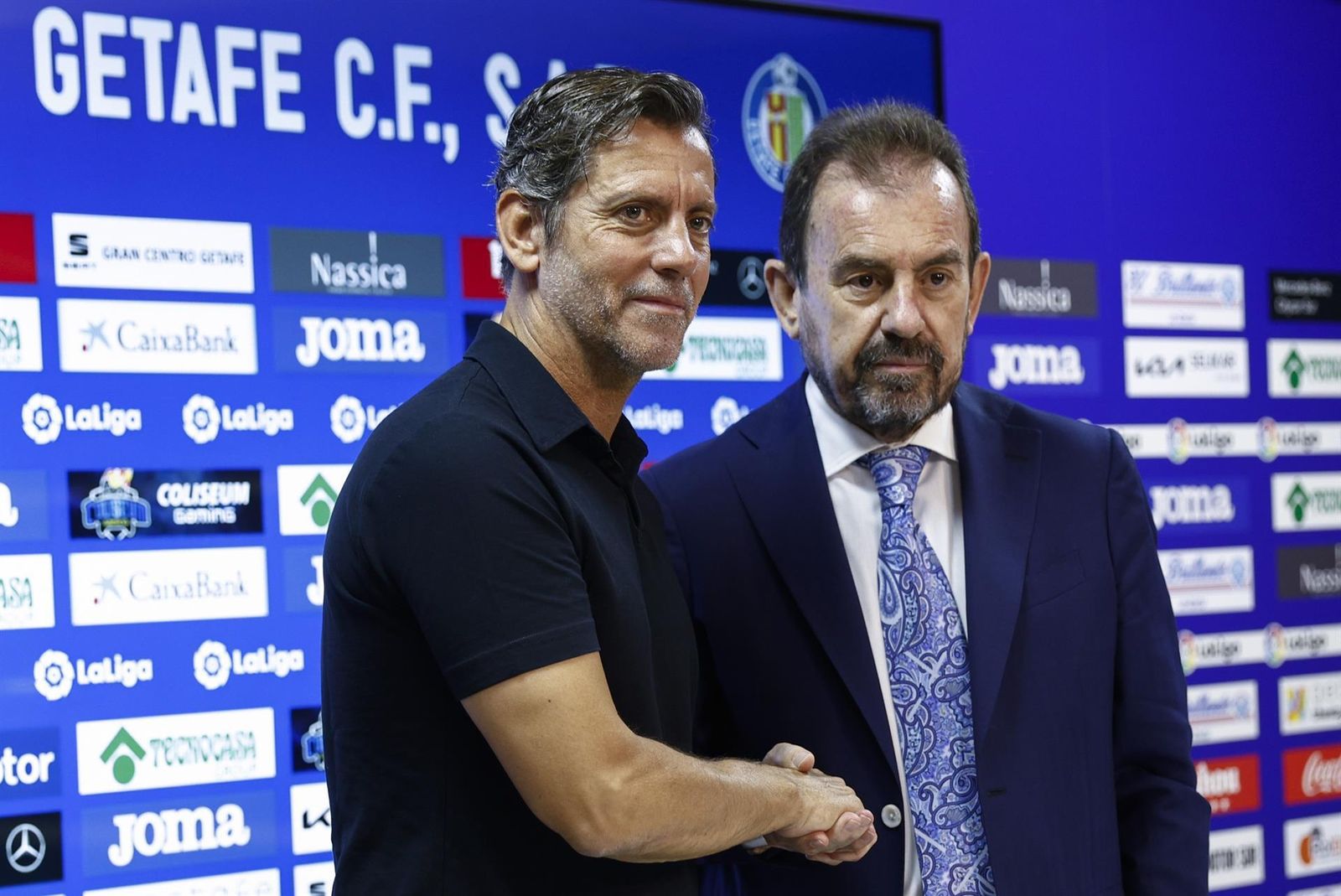 Quique Flores y Ángel Torres, el día de la renovación del entrenador.