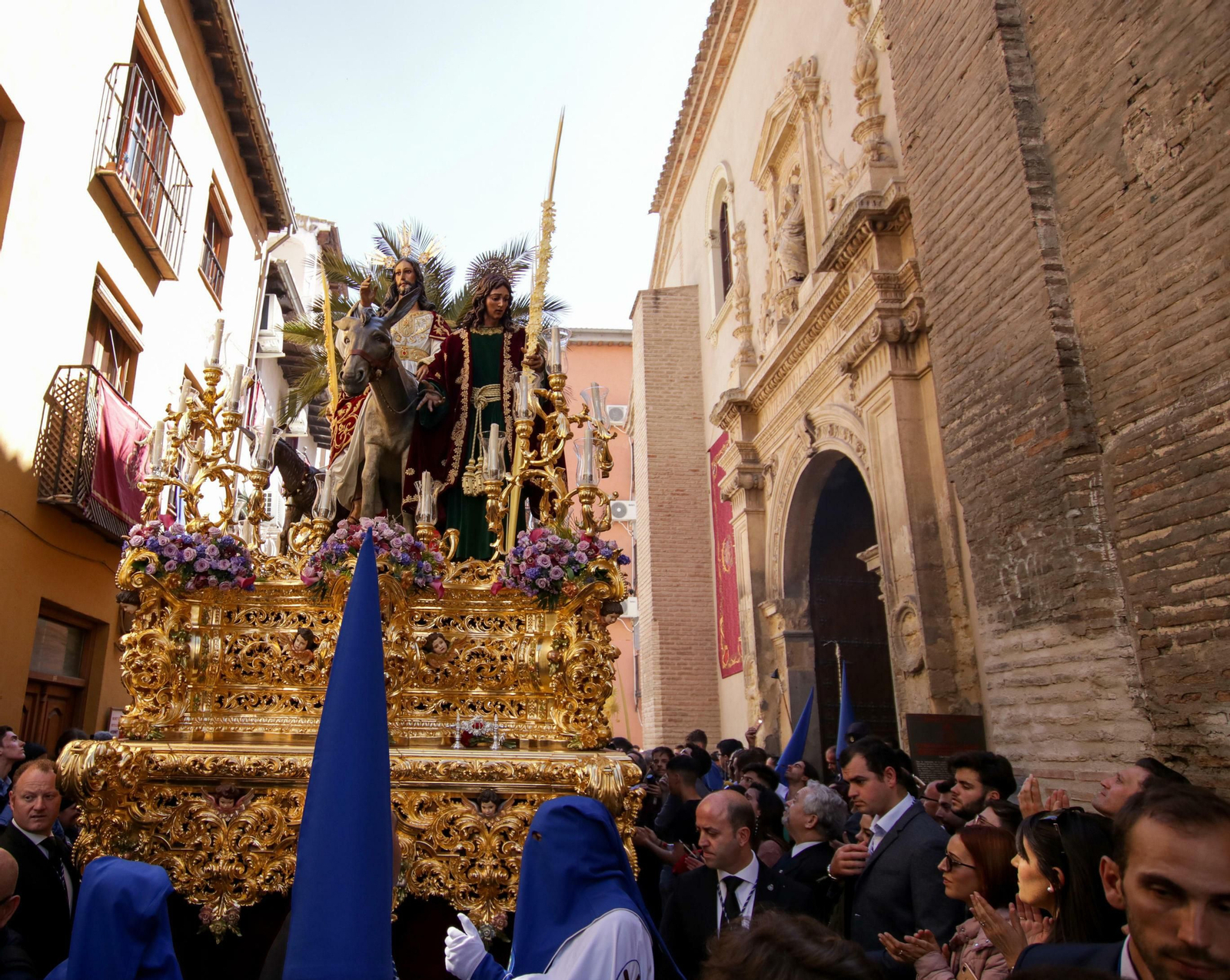 Galería de fotos de La Borriquilla en un soleado Domingo de Ramos