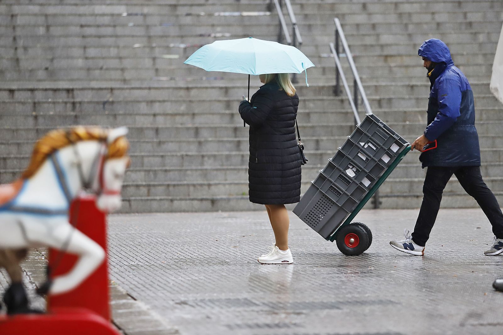 imágenes de la lluviosa mañana en Huelva