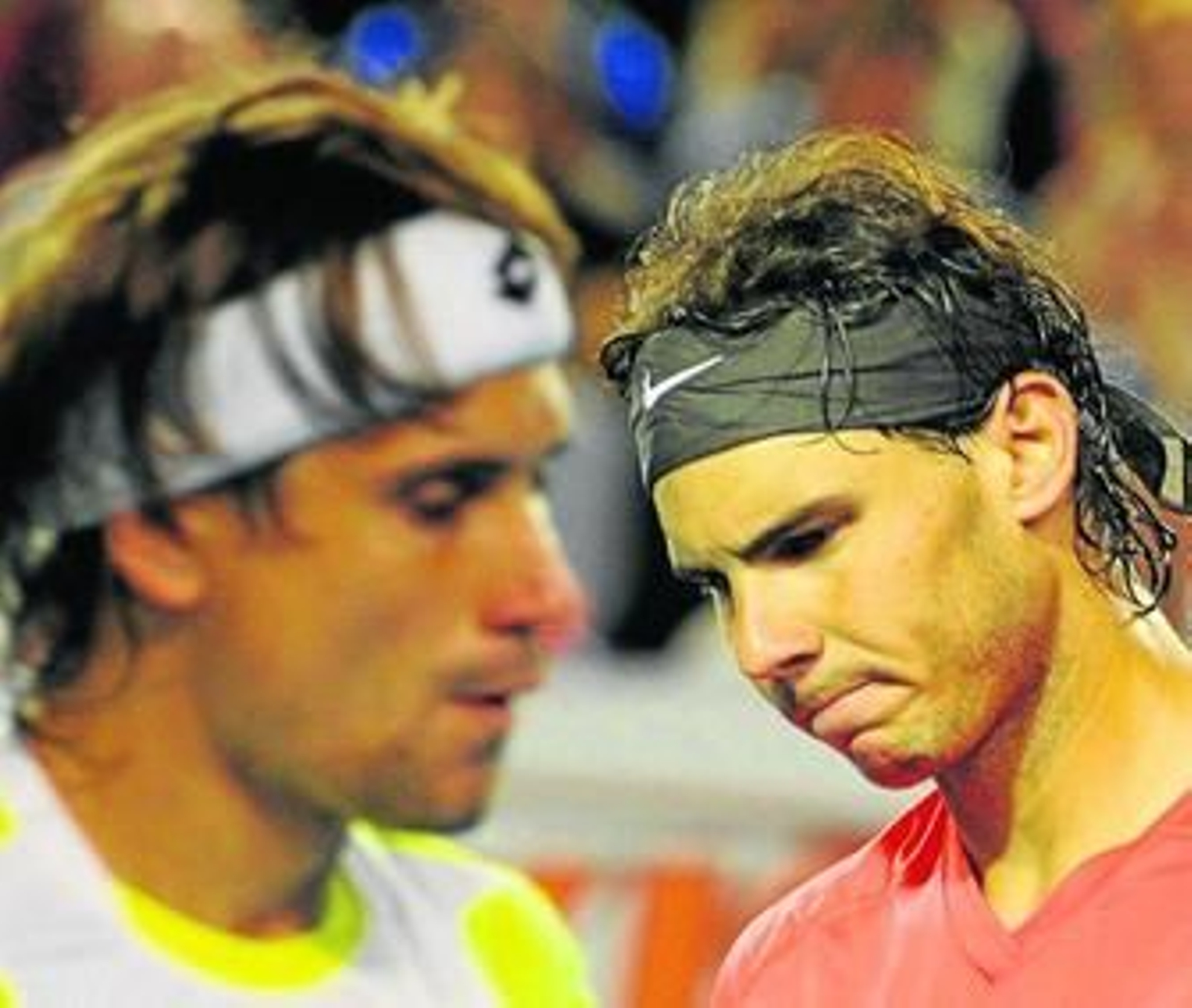 Rafael Nadal expresa su tristeza ante la presencia de Ferrer tras un punto del choque.