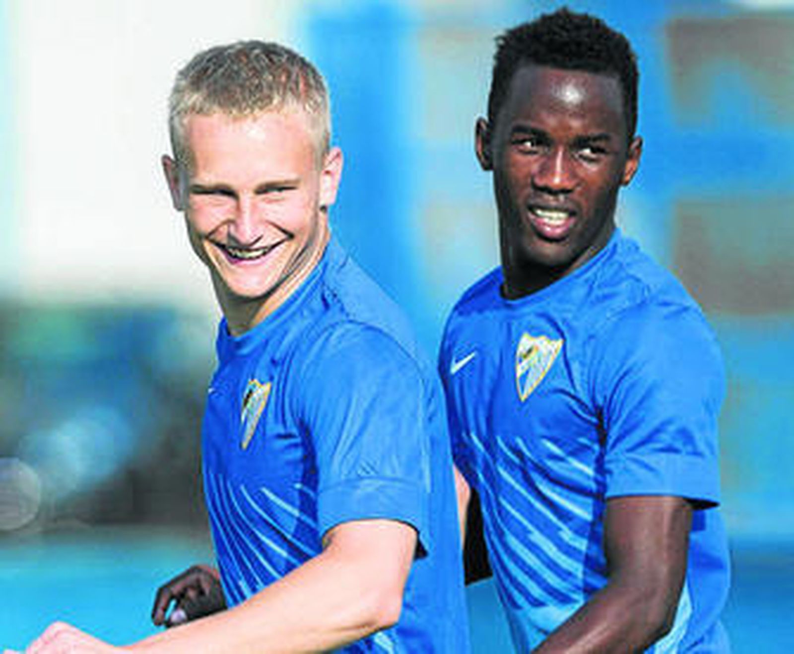 Pawlowski y Fabrice sonríen durante el entrenamiento.