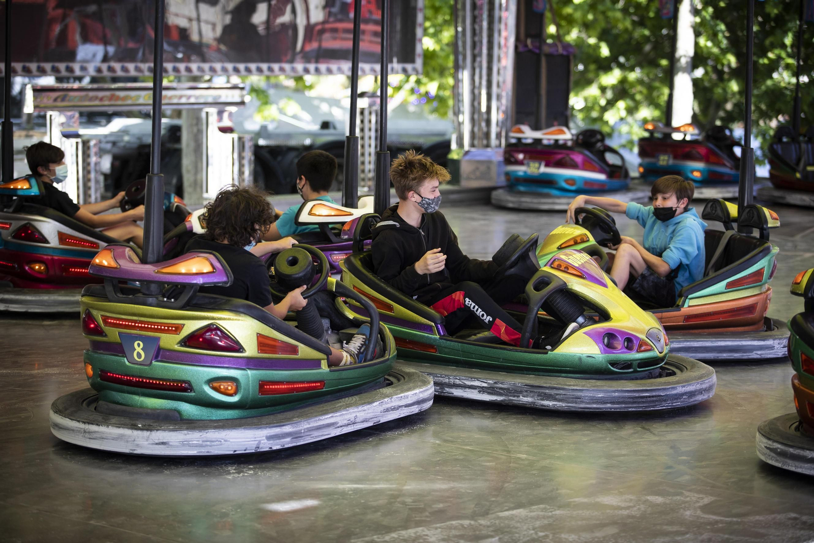 Fotos: el ferial de Granada cobra vida con los columpios