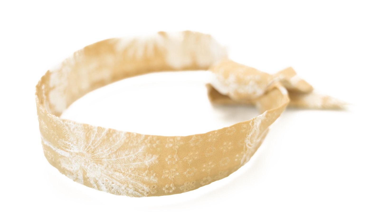 Diadema de la firma By Leclair.