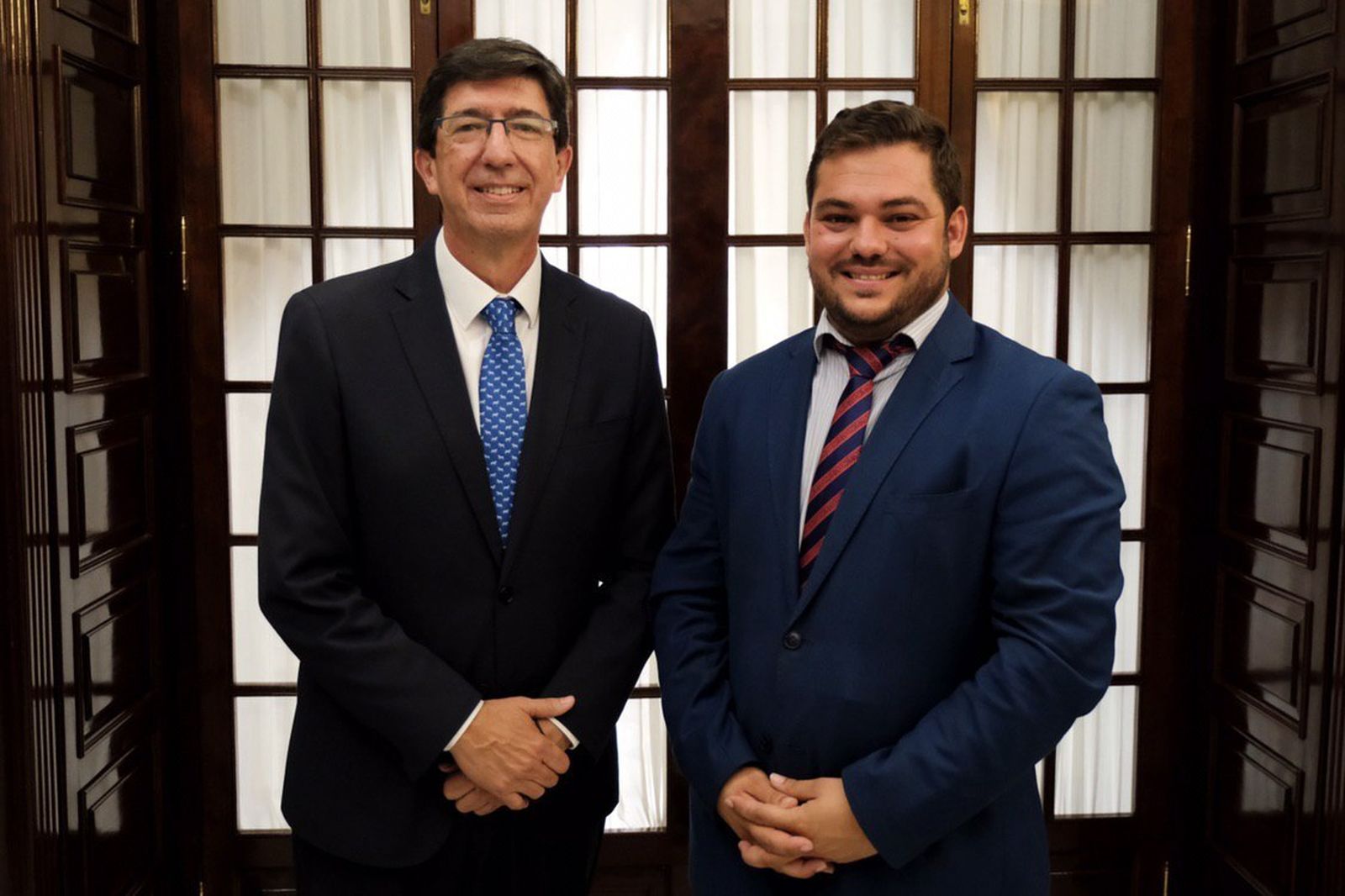 Juan Marín junto al delegado territorial de Justicia en Cádiz, Miguel Rodríguez.