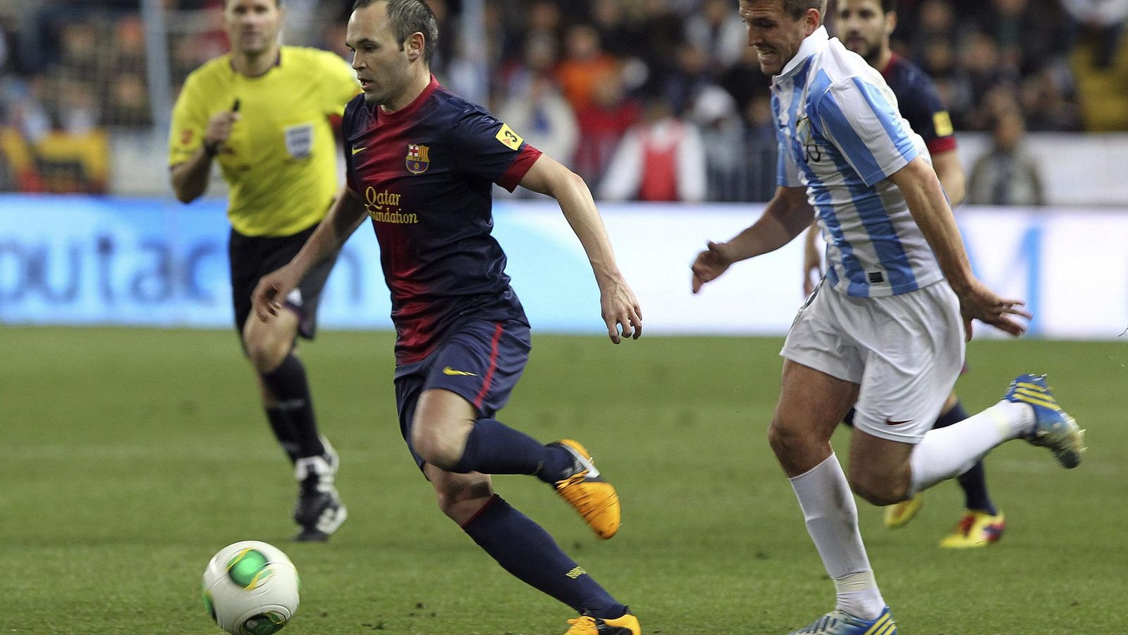 Las fotos de Andrés Iniesta en La Rosaleda con España y el Barcelona Las fotos de Andrés Iniesta en La Rosaleda con España y el Barcelona