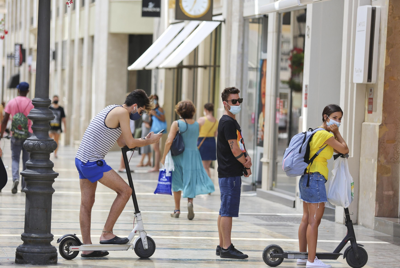 Fotos del primer día de mascarillas obligatorias en las playas y el Centro de Málaga