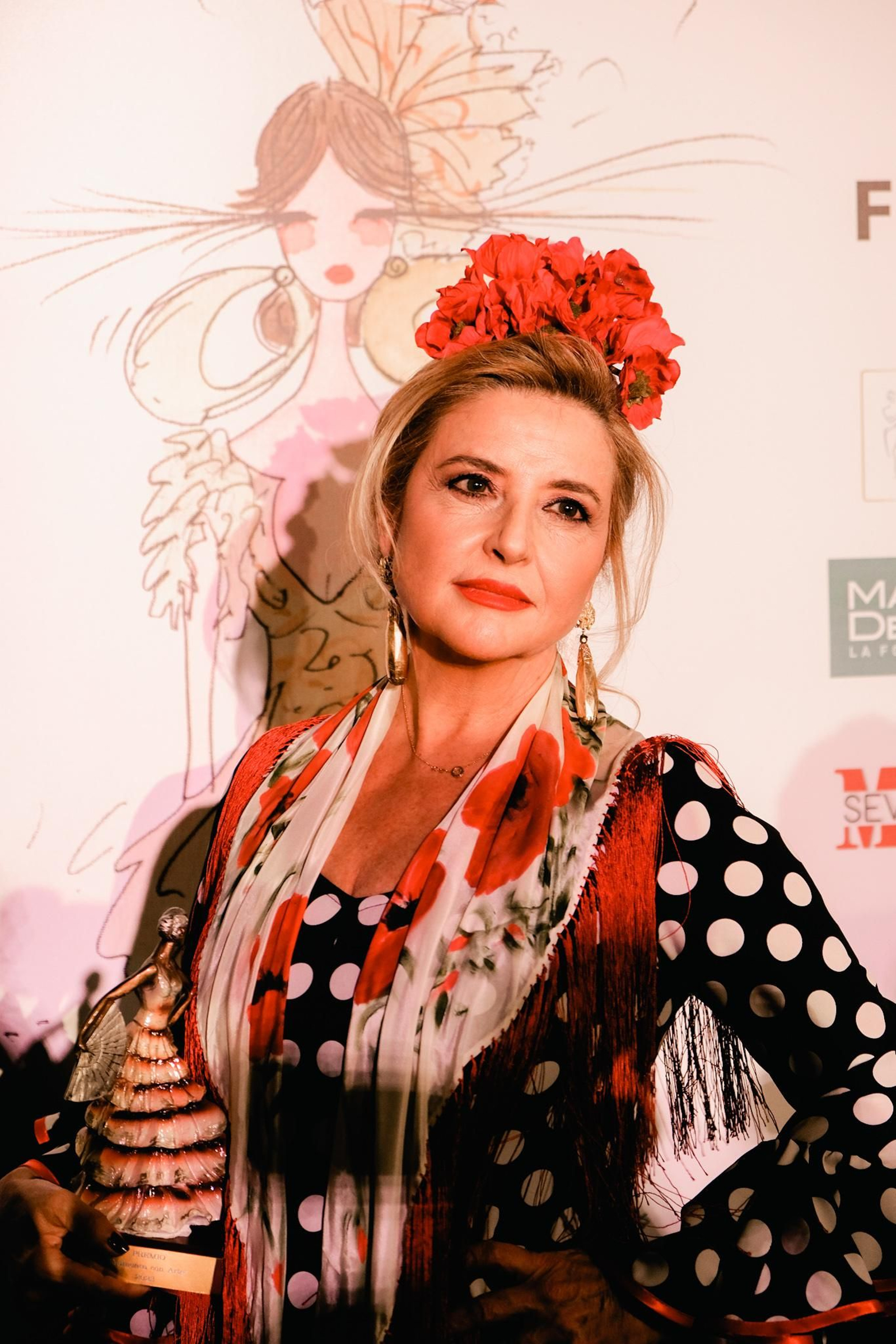 Inmaculada Casal en la presentación de la nueva colección de moda flamenca de Ángeles Verano.