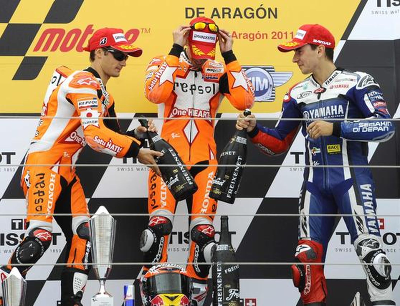 Dani Pedrosa, Casey Stoner y Jorge Lorenzo.

Foto: Reuters / Afp Photo / Efe
