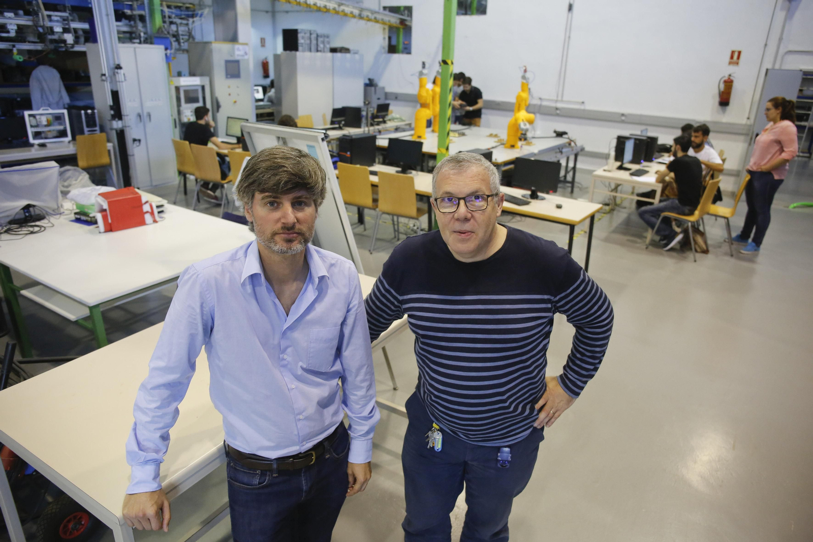 Carlos Pérez del Pulgar (izda.) con el catedrático Alfonso García Cerezo.