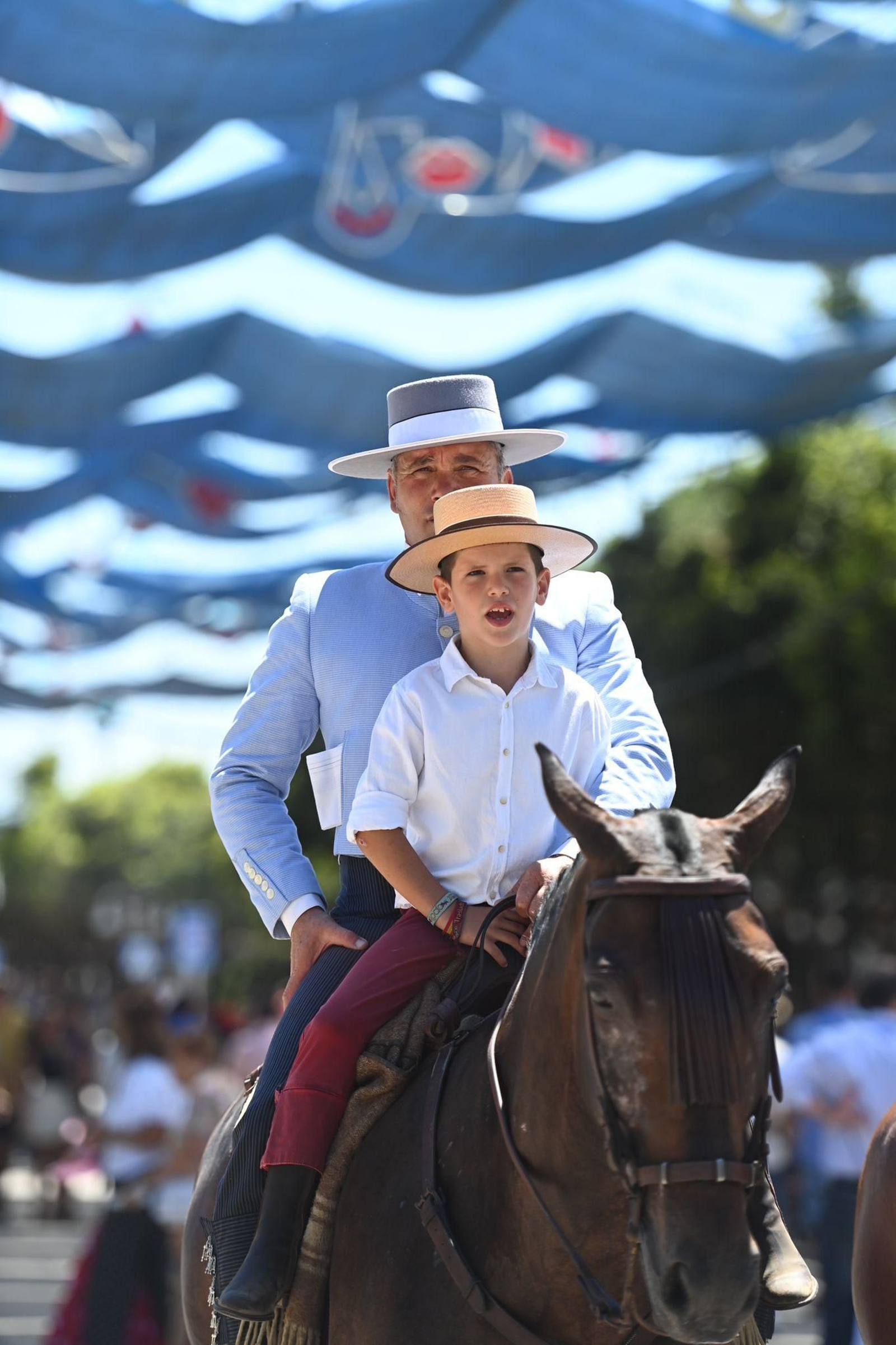 Las fotos del lunes festivo en la Feria en Málaga