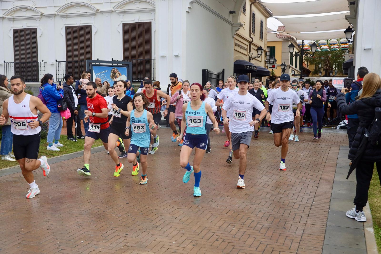 La Carrera por el Día Internacional de la Mujer en Málaga, en fotos