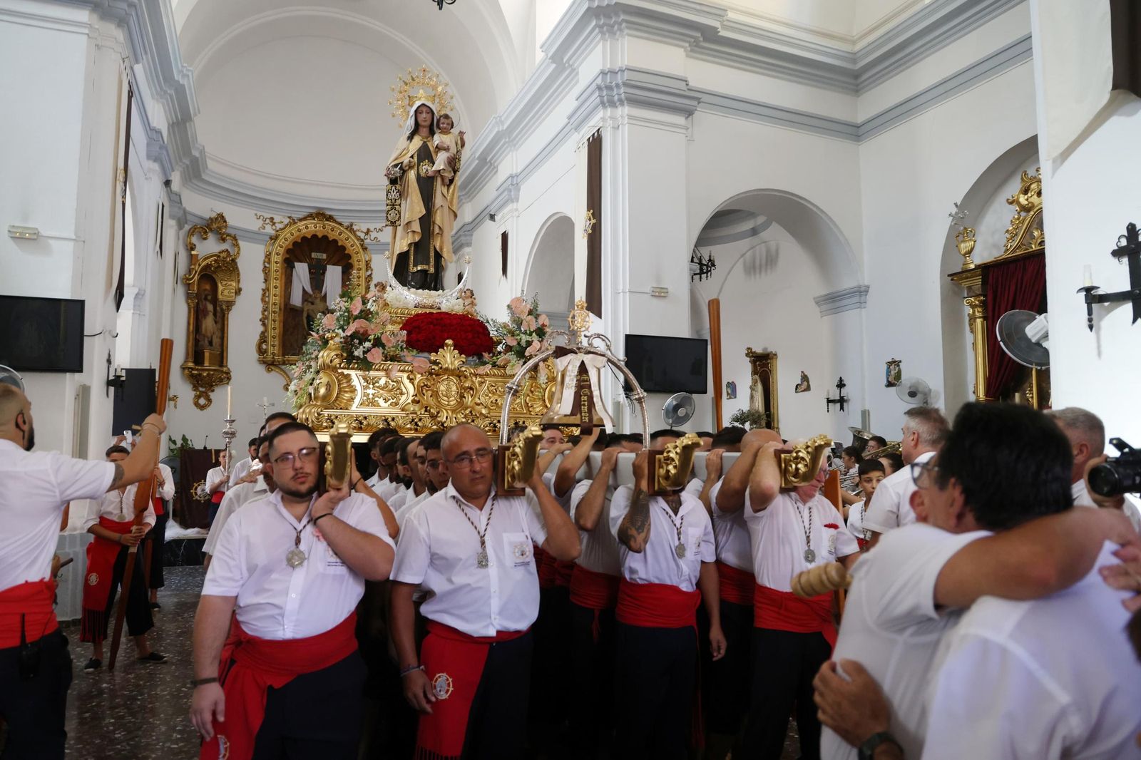 La procesión de la Virgen del Carmen en El Palo, en Málaga, en imágenes