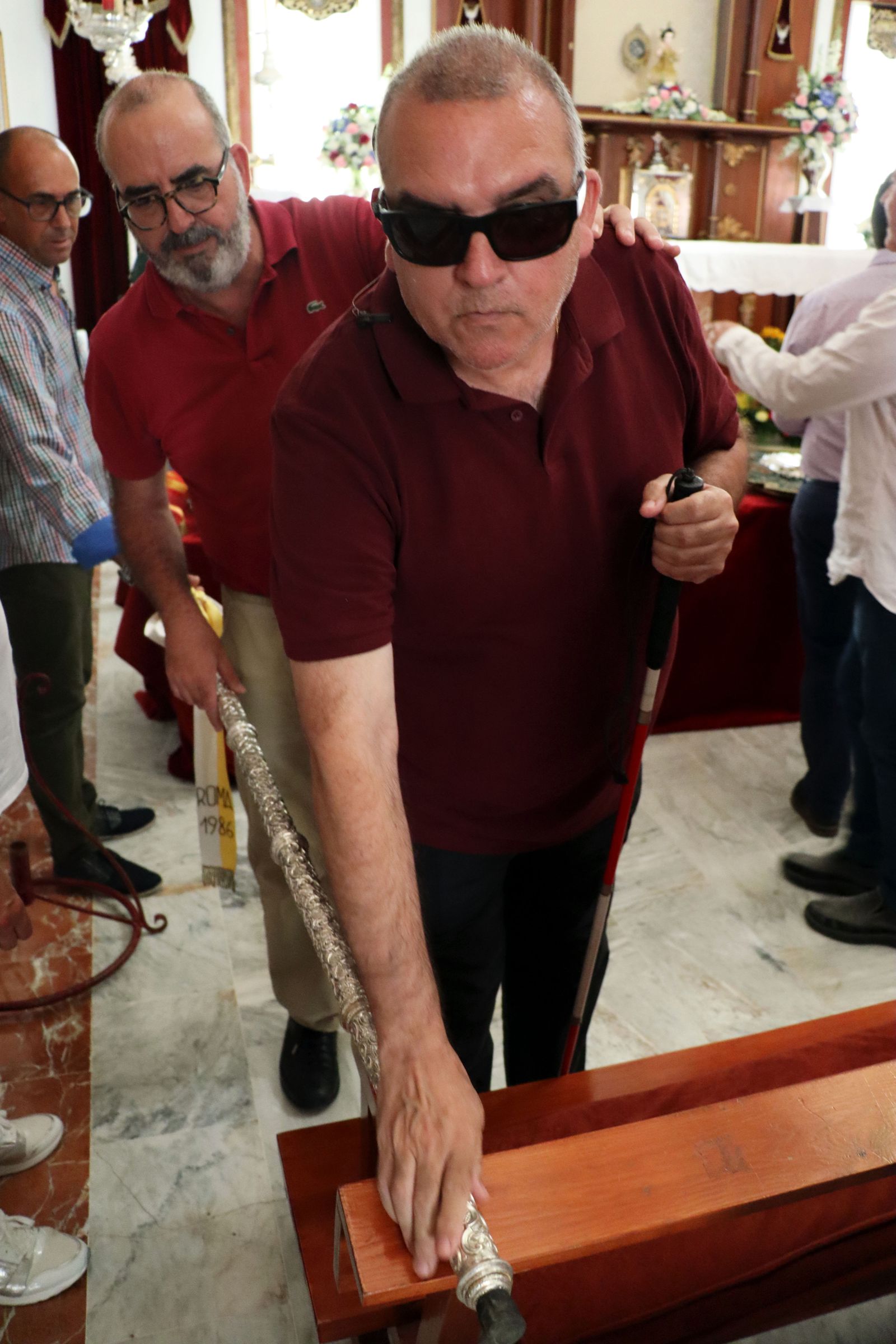 Visita guiada de la ONCE a la Hermandad de Emigrantes de Huelva, en imágenes