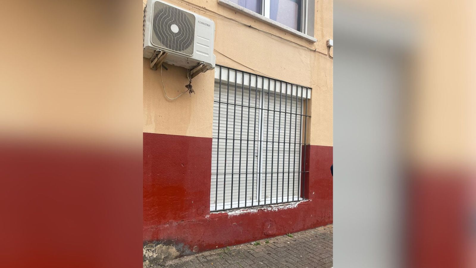 Ventana donde se produjo el tiroteo en el barrio de la Trinidad