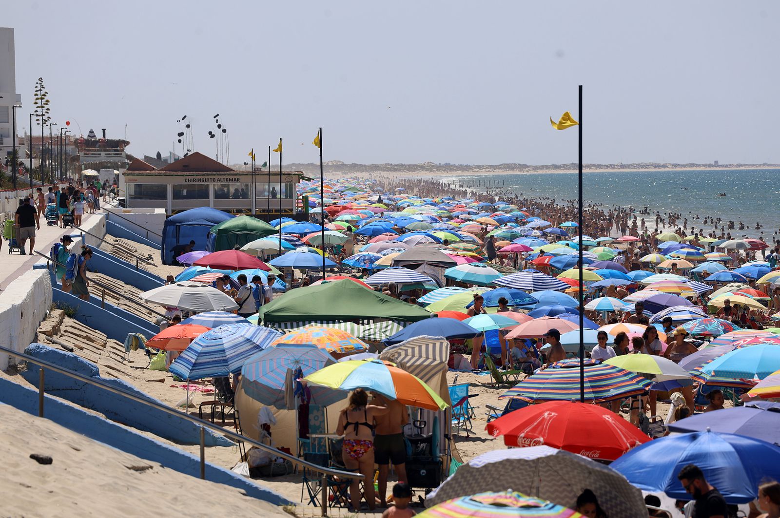 Imágenes de una mañana de calor y playa en Matalascañas