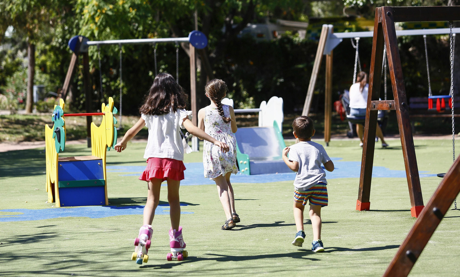 Fotos de la reapertura de los parques infantiles en Málaga.